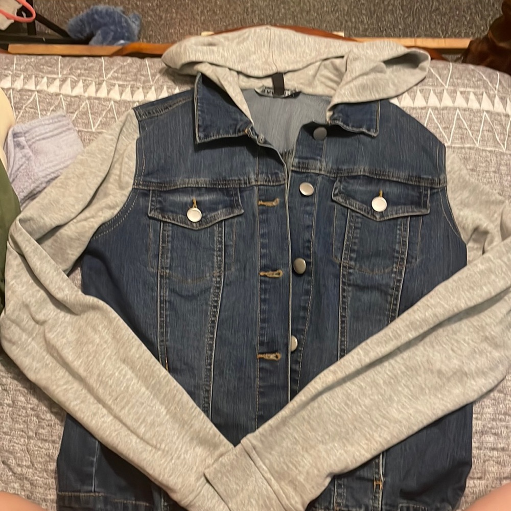 Jean jacket with hood, never worn, real pockets.